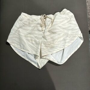 cream/white active shorts, gently used, size medium